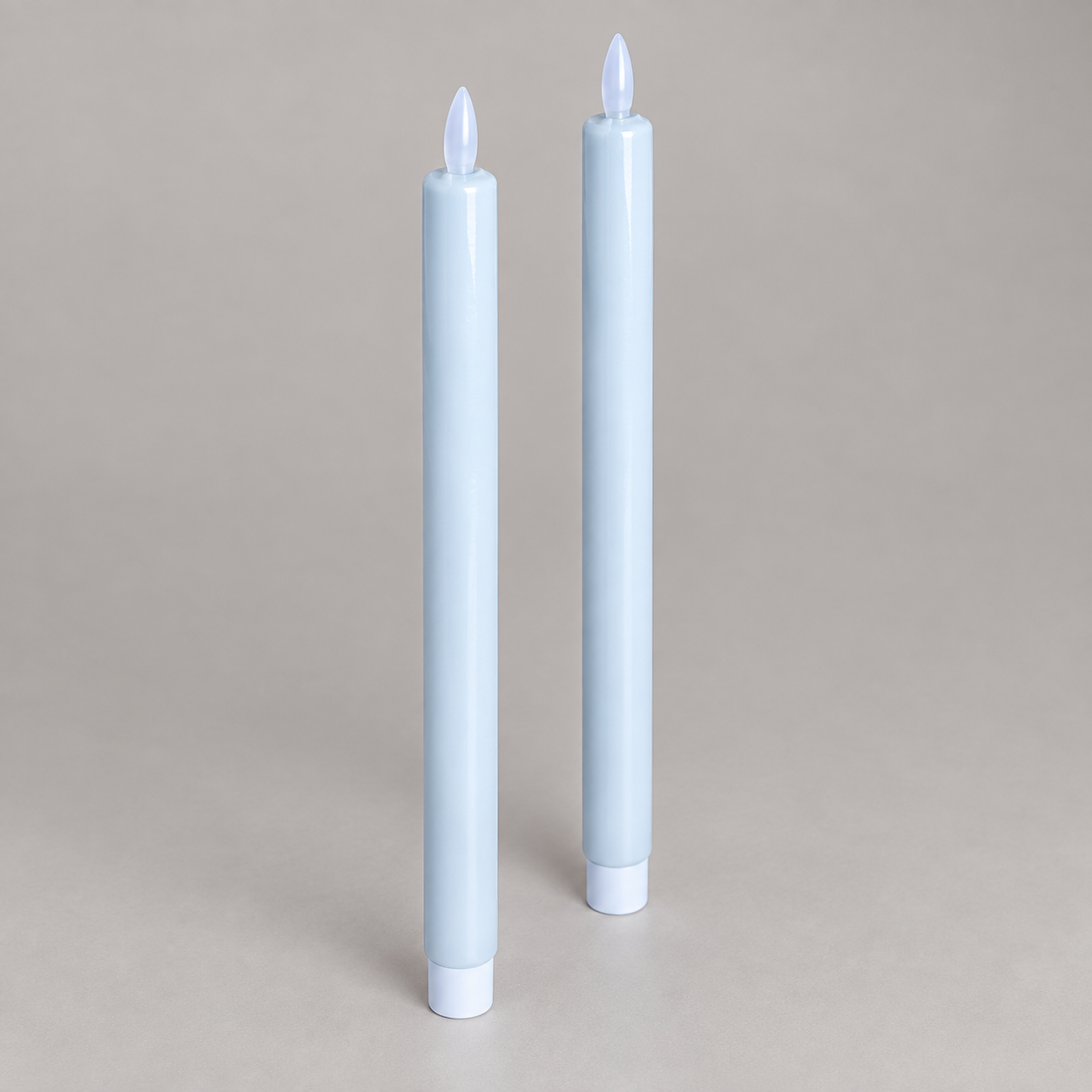 Velas LED Bougies Lumière en ángulo sobre fondo gris