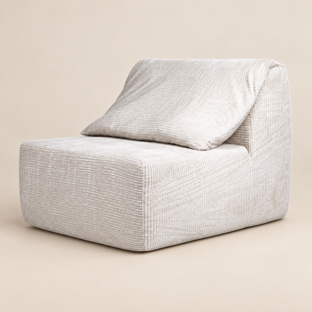 Sofá modular Fauteuil Perle sobre fondo beige