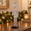 Cascanueces Cristal de Noël en plástico transparente, vista de tres cuartos