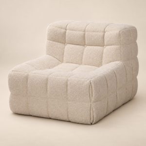 Sofá modular Assise Bouclette sobre fondo beige